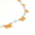 Necklace with orange paper ..