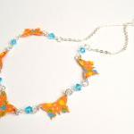 Necklace with orange paper ..