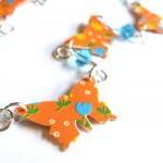 Necklace with orange paper ..