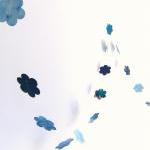 Blue garland with paper flo..