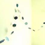 Blue garland with paper flo..