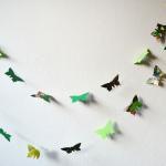 Green paper butterflies gar..